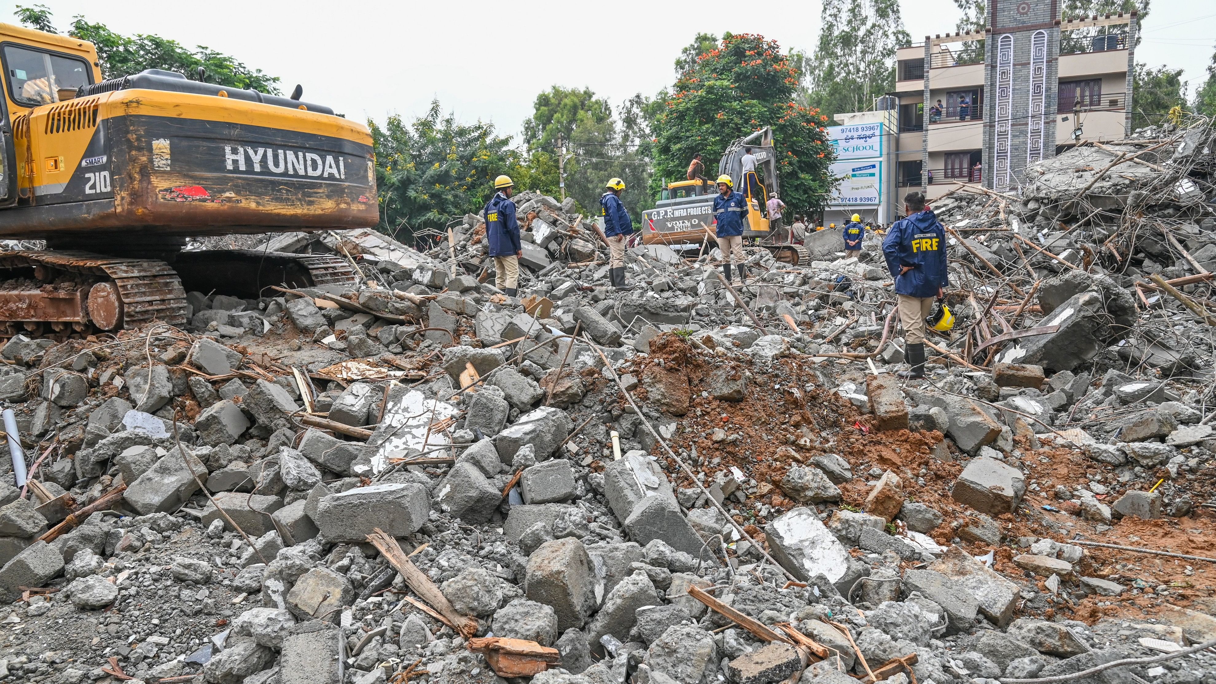 <div class="paragraphs"><p>The under-construction apartment building in eastern Bengaluru's Babusapalya collapsed on Tuesday. Eight construction workers died in the collapse. </p></div>