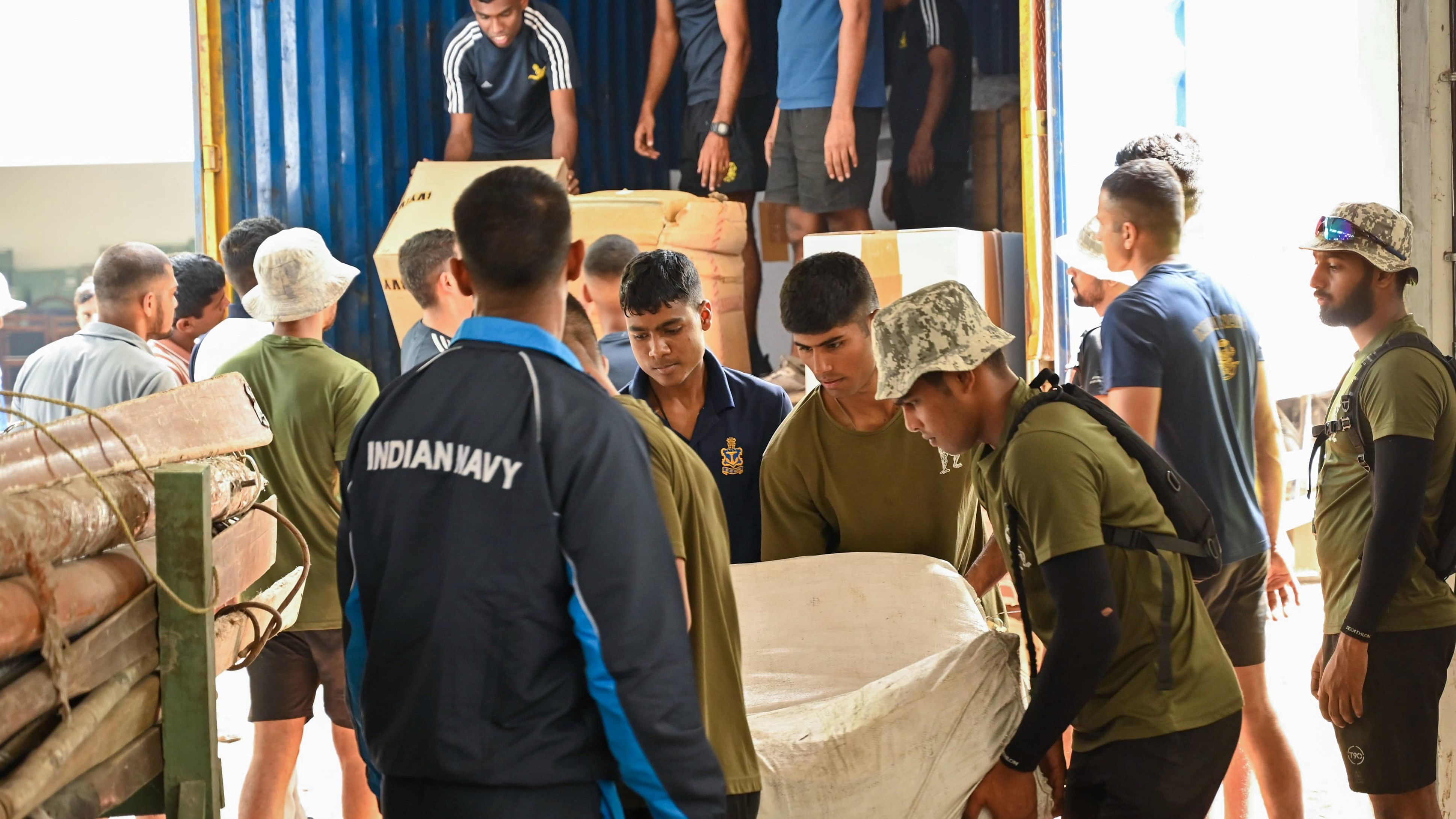 <div class="paragraphs"><p>ndian Navy personnel carry out preparations for Humanitarian Assistance and Disaster Relief (HADR) operations in view of cyclone 'Dana' which is expected to make landfall in Odisha, Thursday.</p></div>