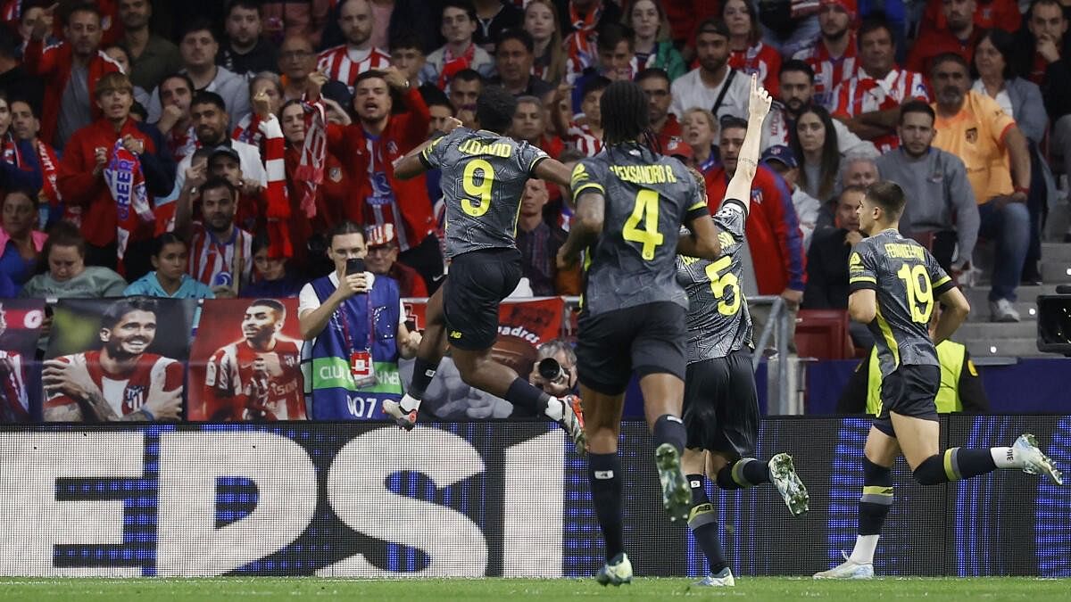 <div class="paragraphs"><p>Lille's Jonathan David celebrates scoring their second goal with teammates.</p></div>