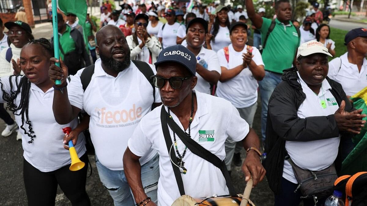 <div class="paragraphs"><p>Afro-Colombians participate in a protest in support of the government of Colombian President Gustavo Petro, while COP 16 is taking place in Cali.</p></div>