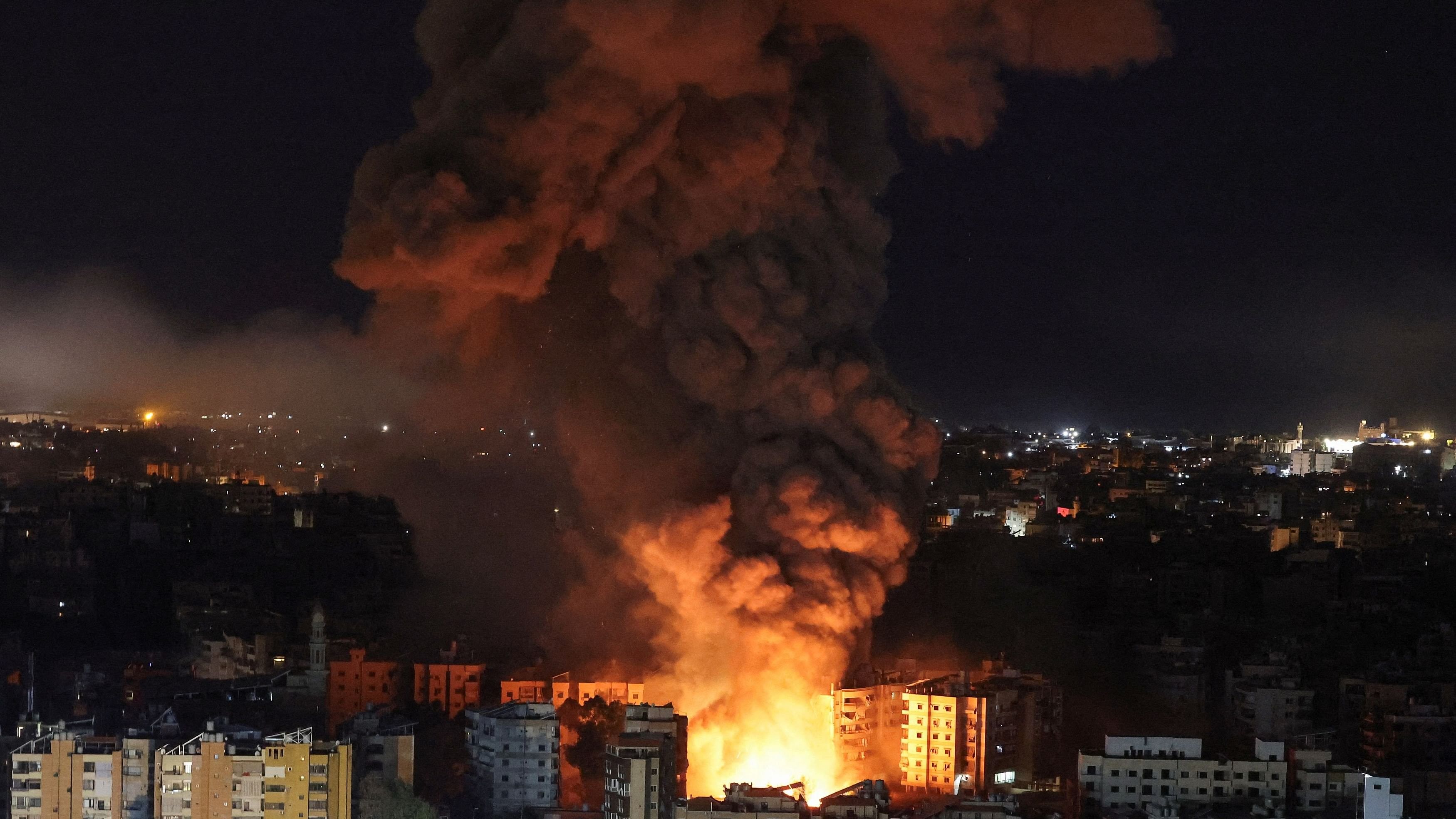 <div class="paragraphs"><p>Smoke billows over Beirut's southern suburbs.</p></div>