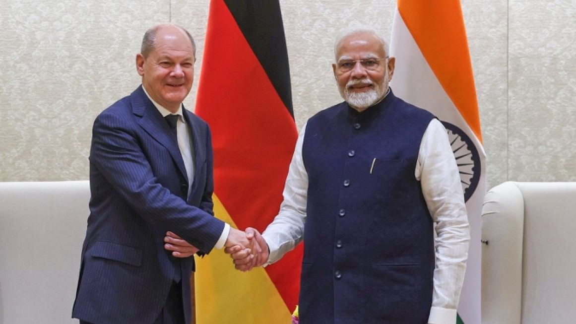 <div class="paragraphs"><p>Prime Minister Narendra Modi (R) and German Chancellor Olaf Scholz (L).</p></div>