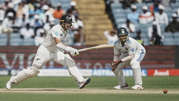 <div class="paragraphs"><p>New Zealand's captain Tom Latham plays a shot during the second day of the second test cricket match between India and New Zealand, at the Maharashtra Cricket Association Stadium, in Pune.</p></div>