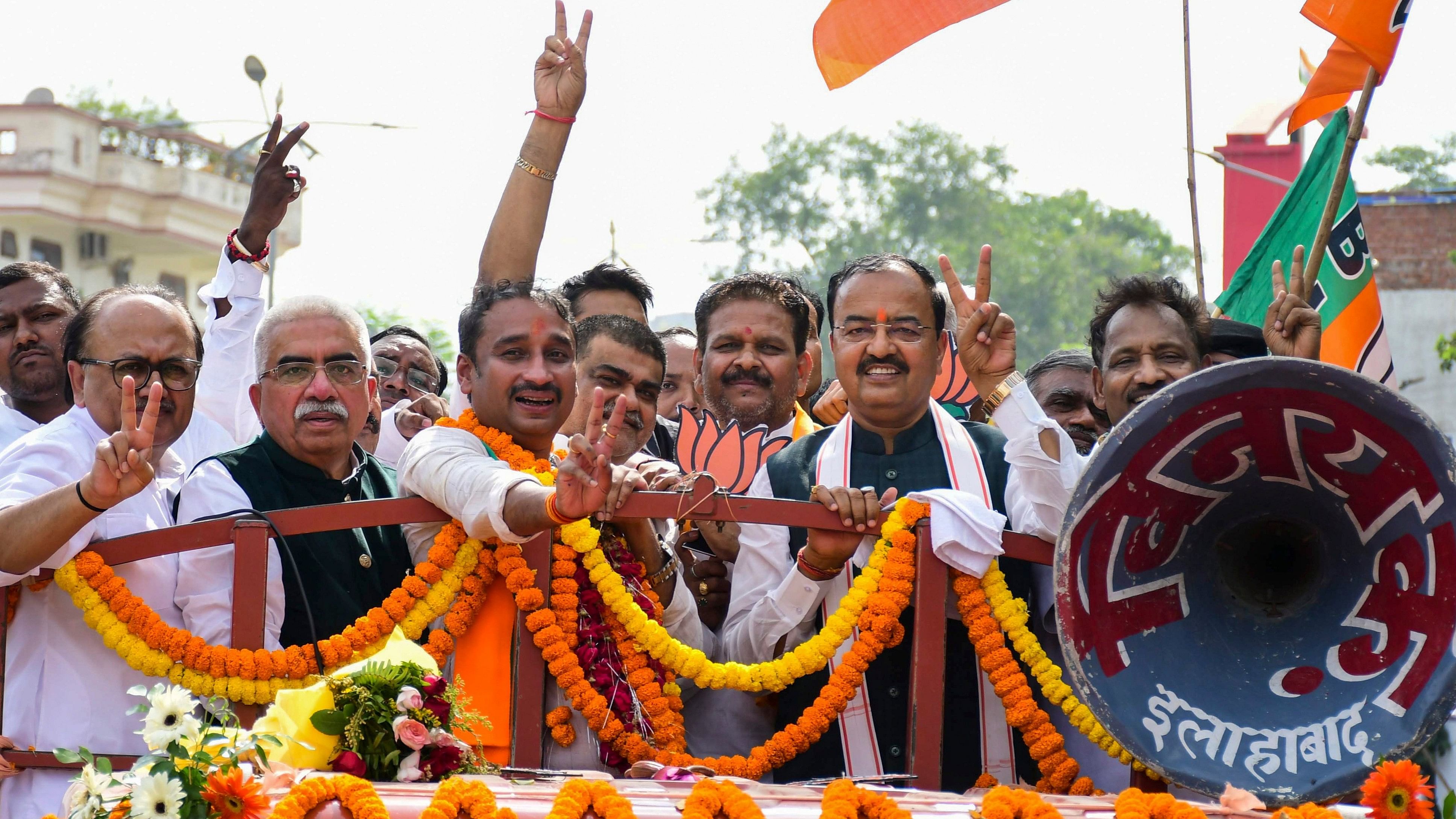 <div class="paragraphs"><p>Uttar Pradesh Deputy Chief Minister Keshav Prasad Maurya with BJP candidate Deepak Patel during the latter's nomination rally for UP's Phulpur Assembly constituency bypoll.</p></div>