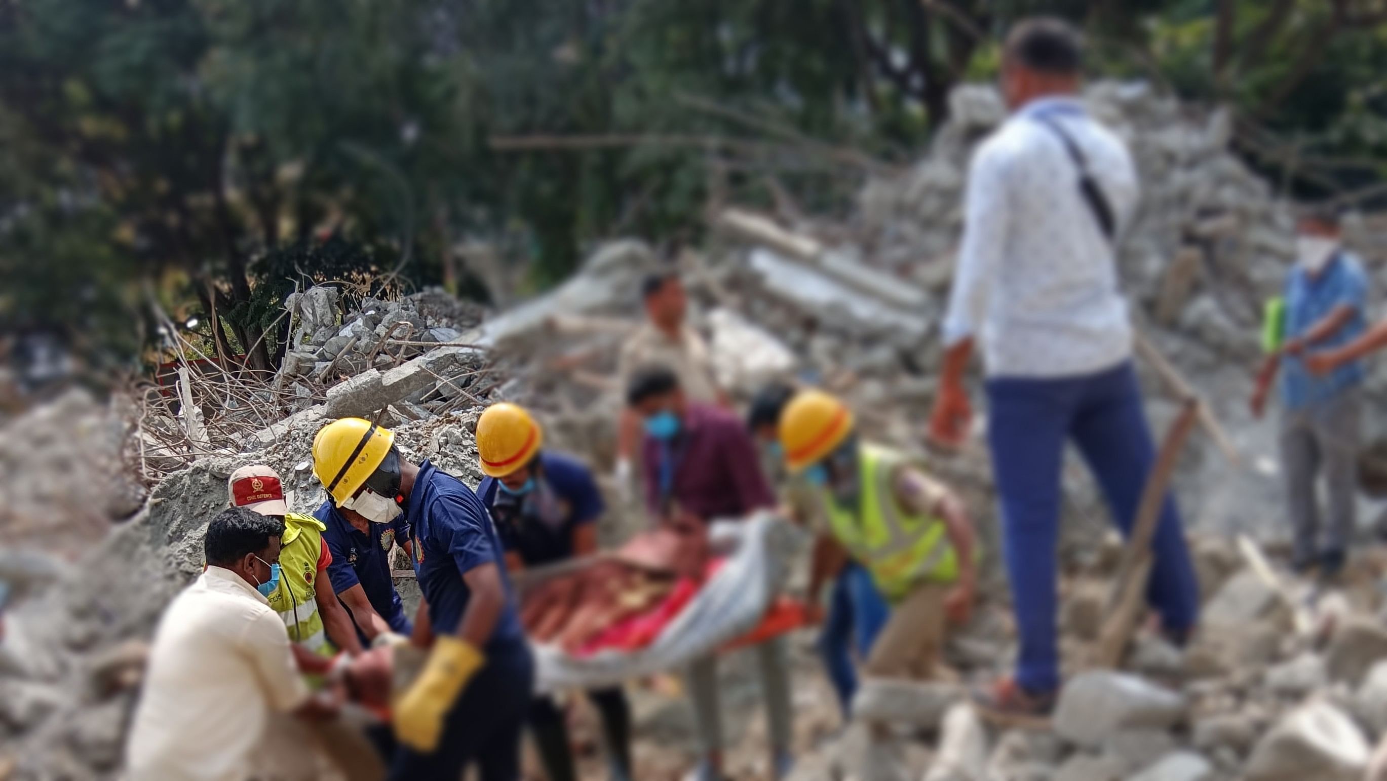 <div class="paragraphs"><p>The last body identified as Elumalai being recovered.</p></div>