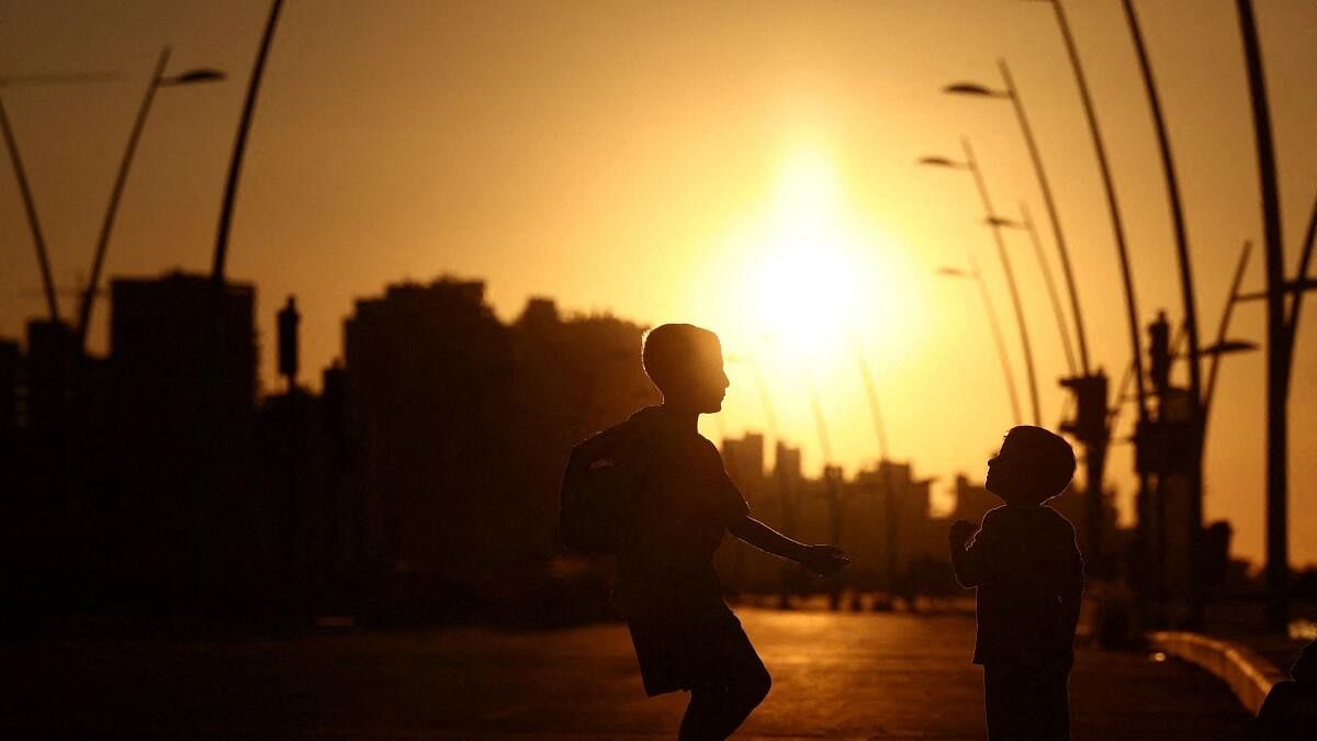 <div class="paragraphs"><p>Children play by the sea while the sun sets over Beirut.</p></div>