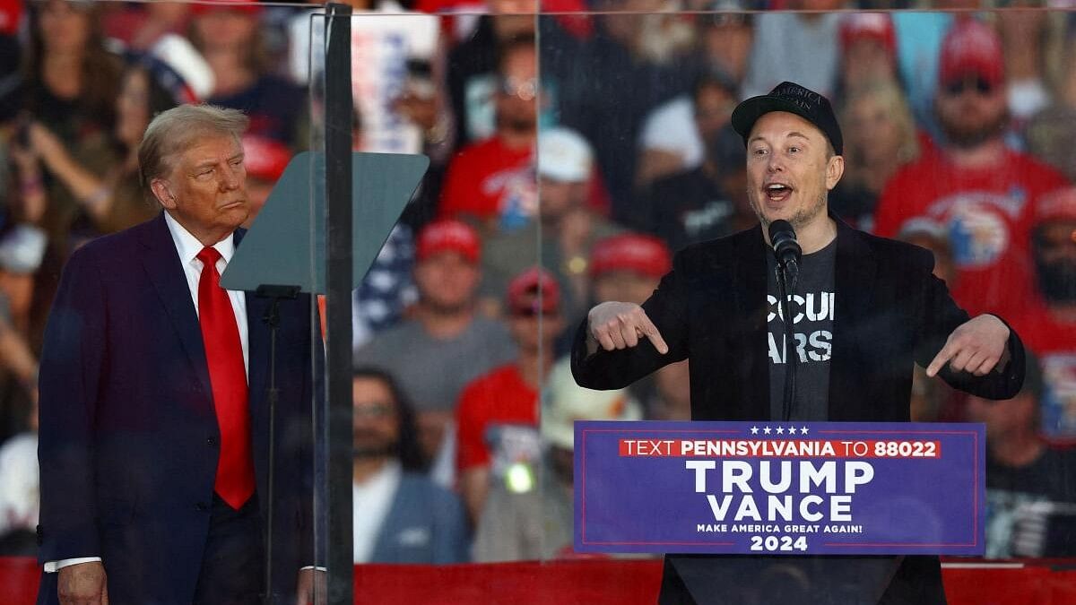 <div class="paragraphs"><p>Tesla CEO and X owner Elon Musk speaks as Republican presidential nominee and former US president Donald Trump looks on during a rally.</p></div>