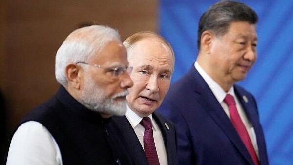 <div class="paragraphs"><p>Narendra Modi seen with Russia's Vladimir Putin and China's Xi Jinping</p></div>