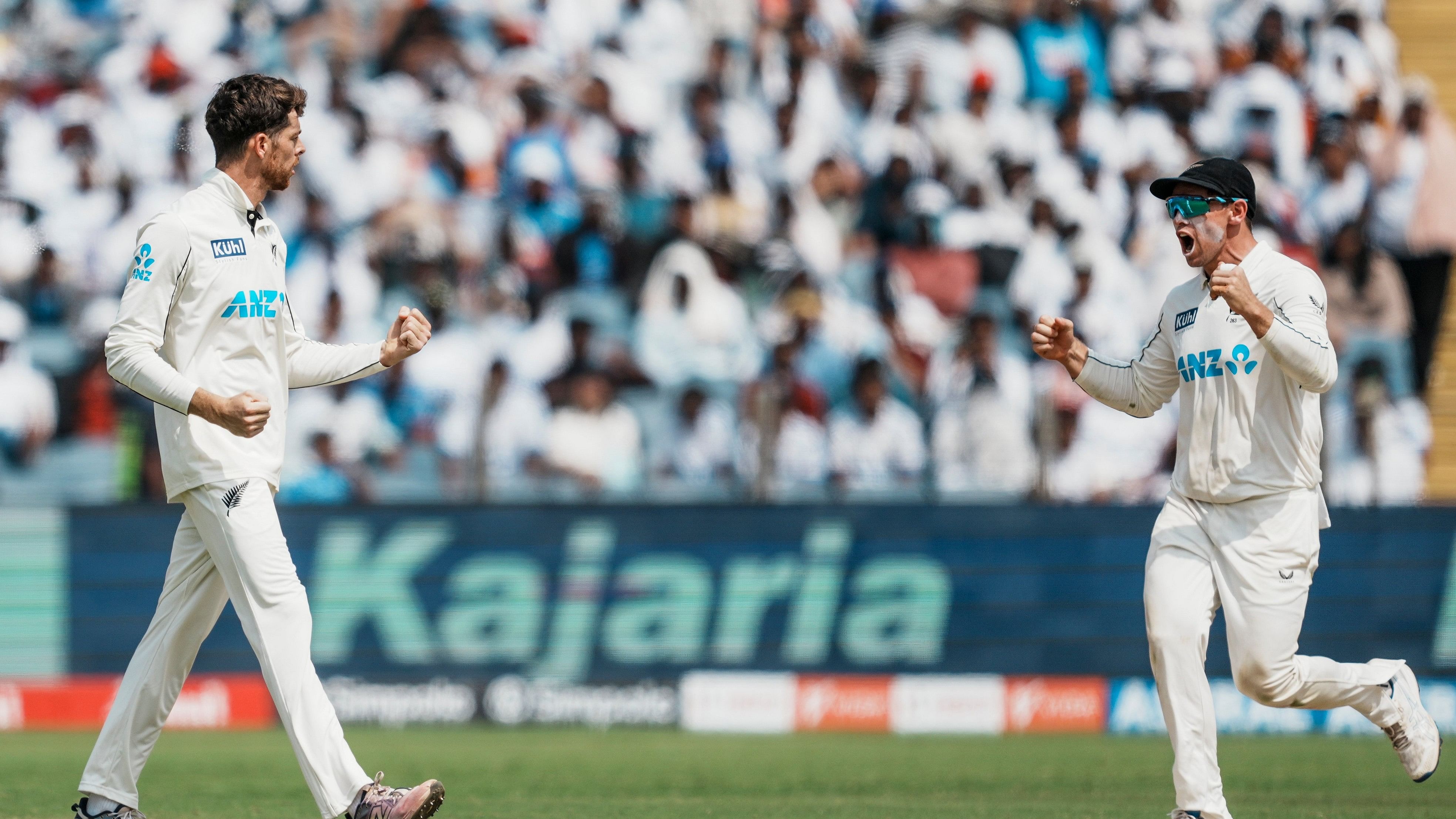 <div class="paragraphs"><p>New Zealand's Mitchell Santner celebrates with captain Tom Latham after taking the wicket of Indias Yashasvi Jaiswal on the third day of the second test cricket match between India and New Zealand, at the Maharashtra Cricket Association Stadium, in Pune, Saturday, Oct. 26, 2024. </p></div>