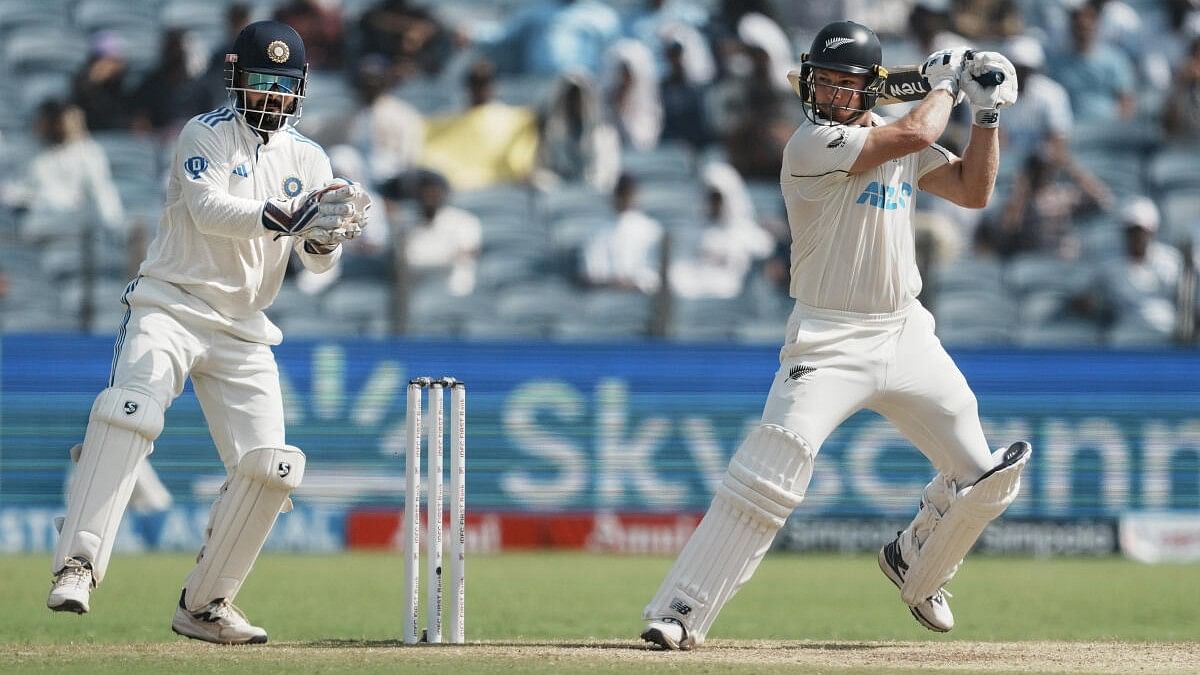 <div class="paragraphs"><p>New Zealand’s Glenn Phillips plays a shot on the third day of the second test cricket match between India and New Zealand, at the Maharashtra Cricket Association Stadium, in Pune.</p></div>