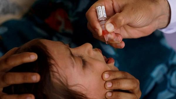 <div class="paragraphs"><p>Polio vaccine drops are administered to a child at a civil dispensary in Peshawar.</p></div>