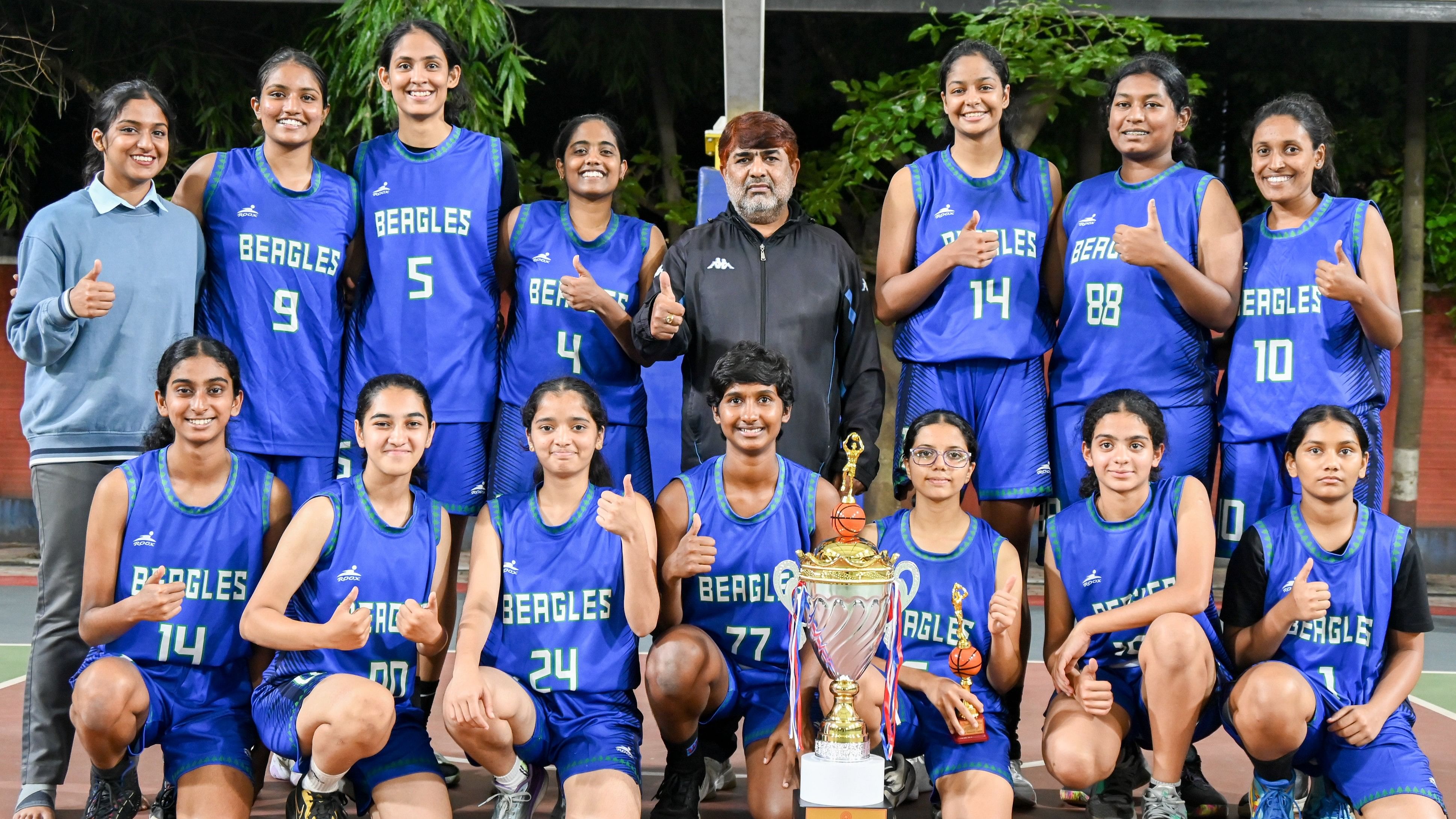 <div class="paragraphs"><p>Winners of Begals BC (standing from left) Harshitha (Manager), Nekhala, Bhumika Singh, Chandana, Mohan Kumar (Coach), Sanjana Ramesh, Renetta, Bhavya, (sitting front row from left) Rachana, Samara, Gunashree, Medha, Swathi, Purvi and Brunda during the 1st state women basketball League championship organised by Karnataka State Basketball Association at Sree Kanteerava stadium in Bengaluru on22nd July 2024, Monday.</p></div>