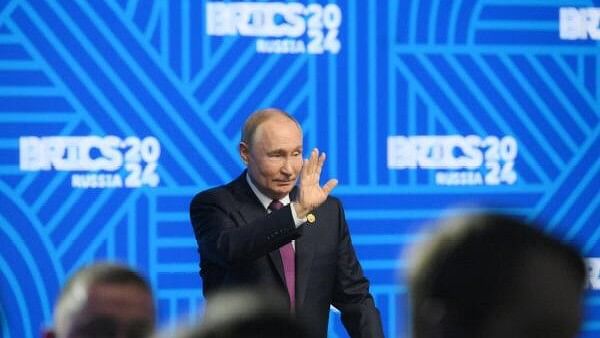 <div class="paragraphs"><p>Russian President Putin attends a press conference at the end of BRICS summit in Kazan.</p></div>