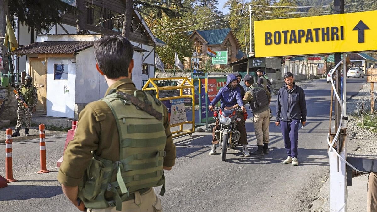 <div class="paragraphs"><p>Security personnel keep vigil on the Gulmarg-Botapathri road during a search operation following a terror attack on an army vehicle in which two soldiers and two army porters were killed, in Gulmarg, Jammu and Kashmir, Friday, Oct 25, 2024.</p></div>