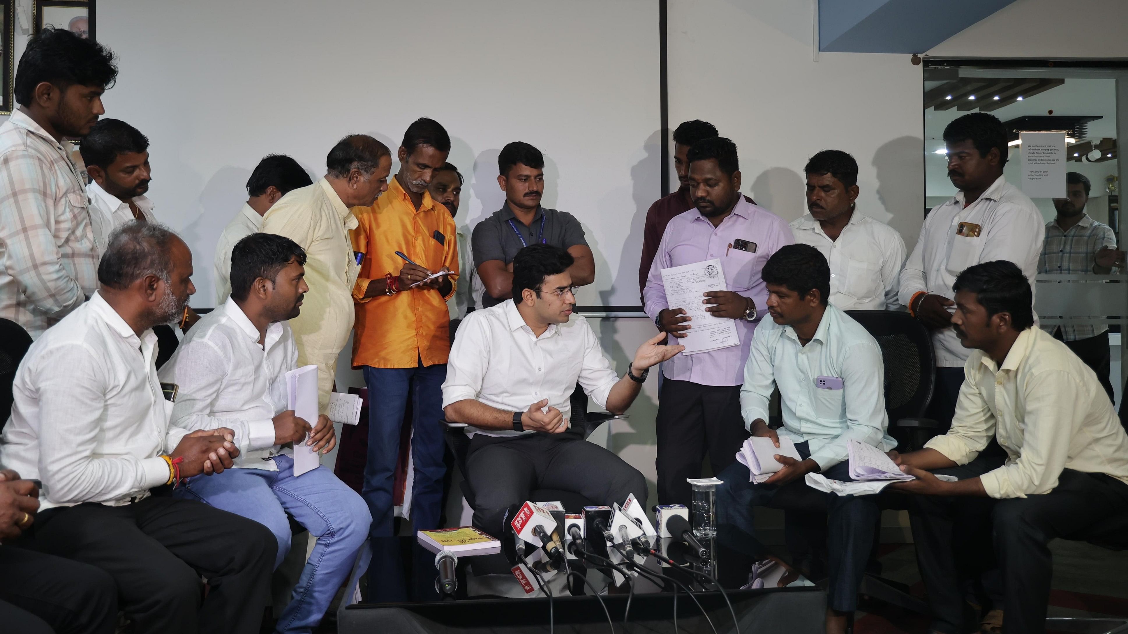 Bangalore South MP Tejasvi Surya meets aggrived farmers from Vijayapura district in Bengaluru on Friday. 