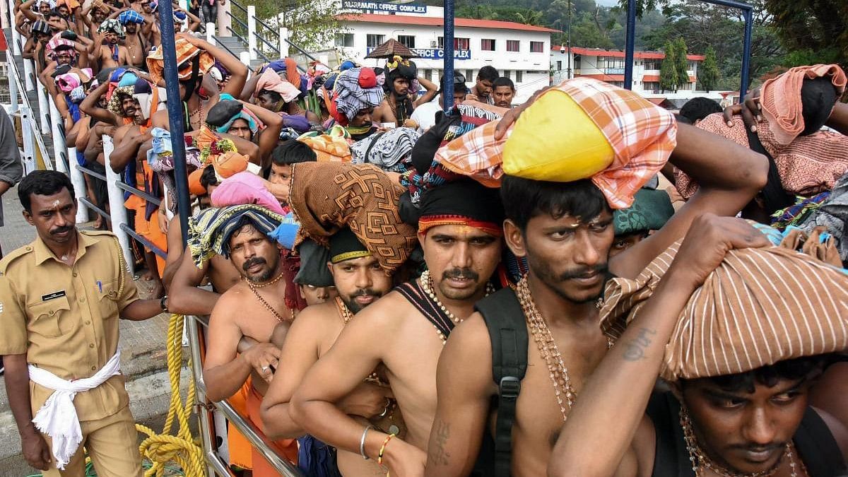 <div class="paragraphs"><p>Lakhs of devotees visit the hill shrine every year and the majority of them carry 'Irumudi Kettu' (the sacred bag containing offerings, including coconut filled with ghee, to the Lord).</p></div>