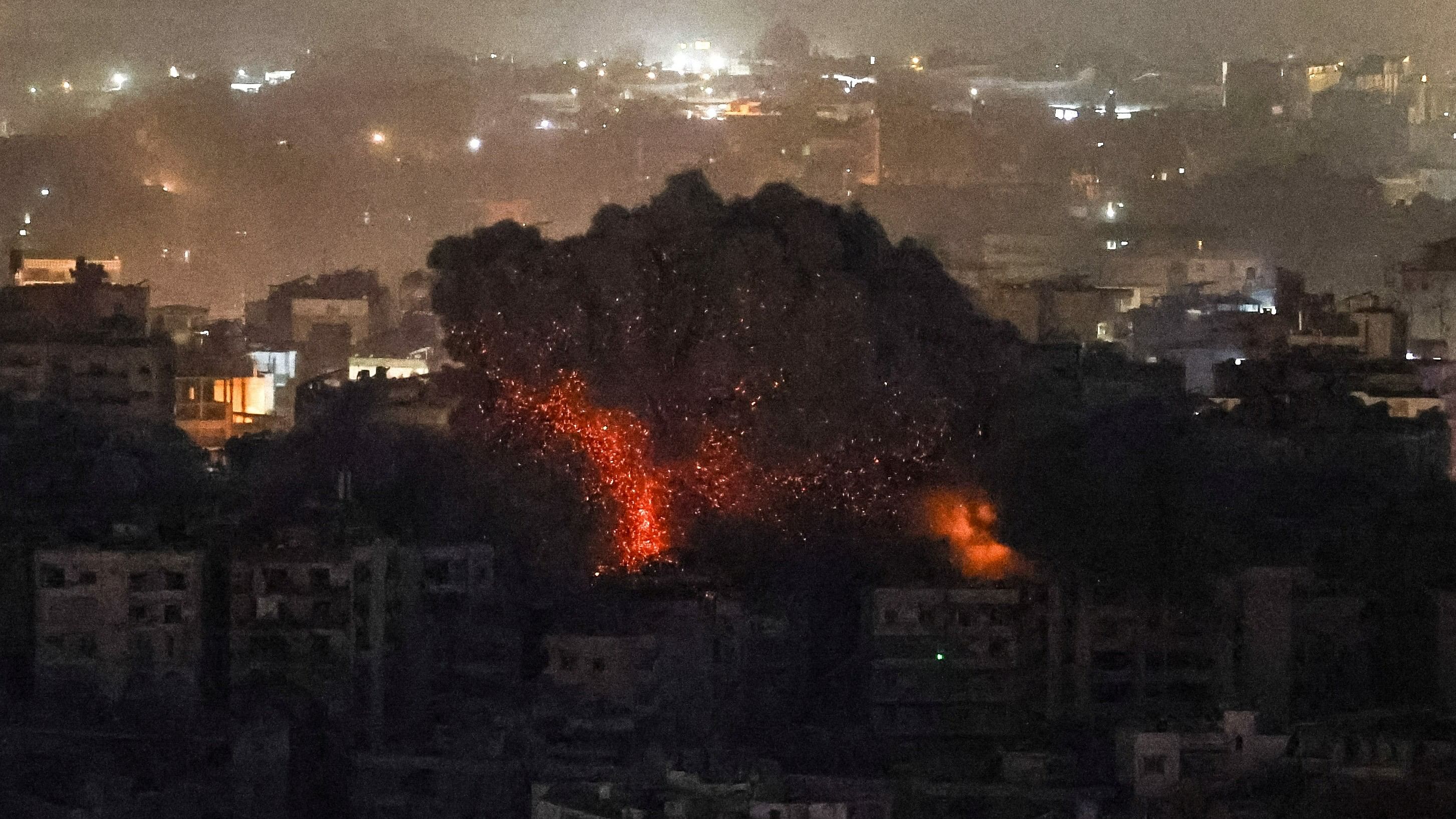 <div class="paragraphs"><p>Smoke billows over Beirut's southern suburbs, after an Israeli strike, amid the ongoing hostilities between Hezbollah and Israeli forces </p></div>