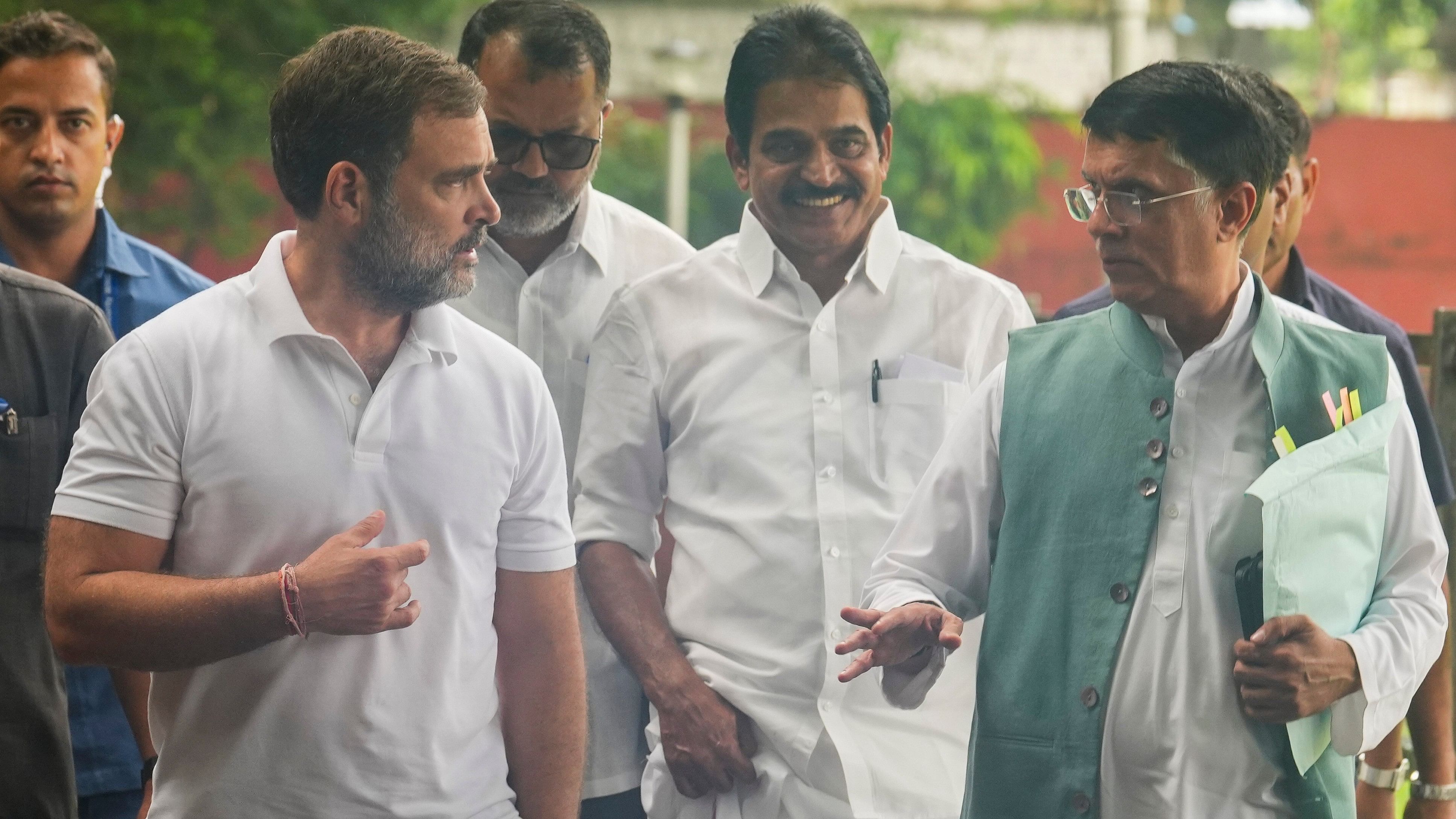 <div class="paragraphs"><p> Congress leader Rahul Gandhi with Pawan Khera and K C Venugopal.</p></div>