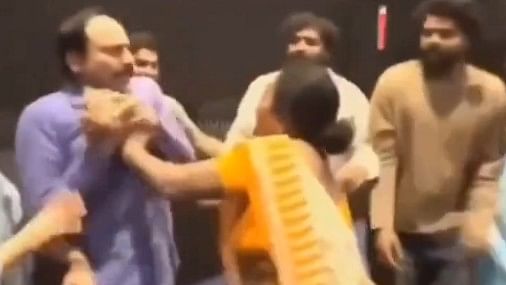 <div class="paragraphs"><p>Screengrab of video showing actor N T Ramaswamy being attacked by a woman.</p></div>