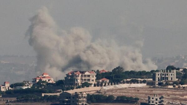 <div class="paragraphs"><p>Smoke billows over southern Lebanon, amid ongoing hostilities between Hezbollah and Israeli forces, as seen from northern Israel, October 26, 2024.</p></div>