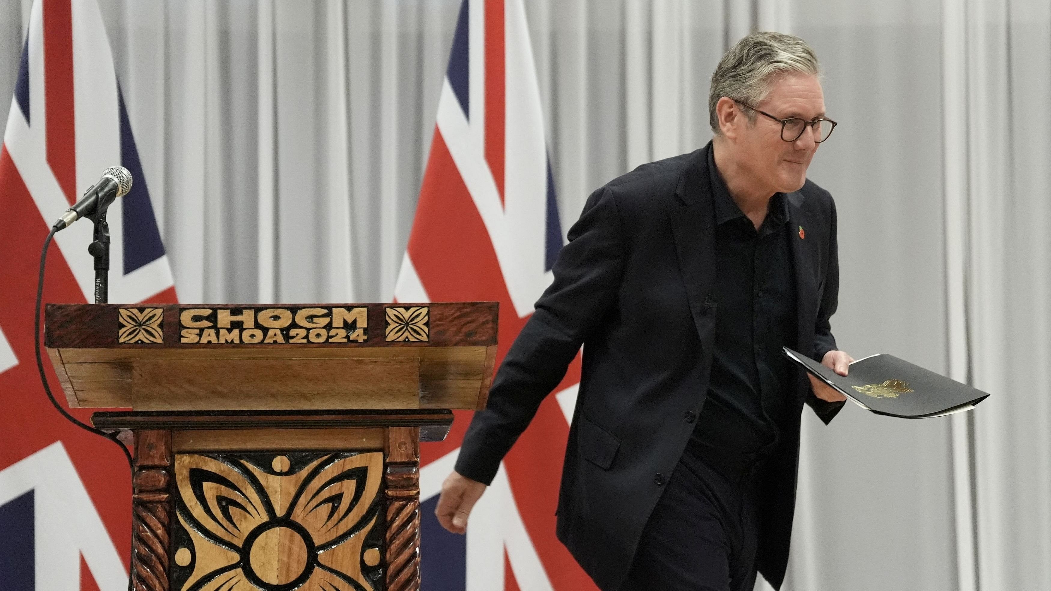 <div class="paragraphs"><p>British Prime Minister Keir Starmer walks at a press conference during the Commonwealth Heads of Government Meeting in Samoa. Picture date: Saturday October 26, 2024. </p></div>