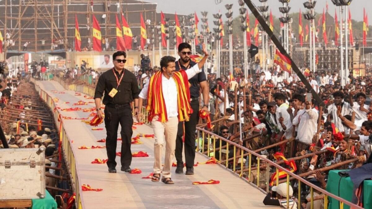 <div class="paragraphs"><p>Actor and founder of Tamilaga Vetri Kazhagam Vijay waves at supporters during his pary's first political conference, at Vikravandi in Villupuram district, Sunday, Oct. 27, 2024.</p></div>