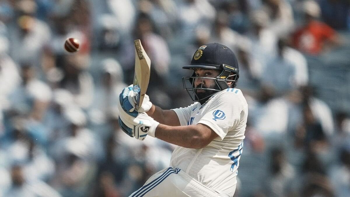 <div class="paragraphs"><p>India’s captain Rohit Sharma plays a shot on the third day of the second test cricket match between India and New Zealand</p></div>