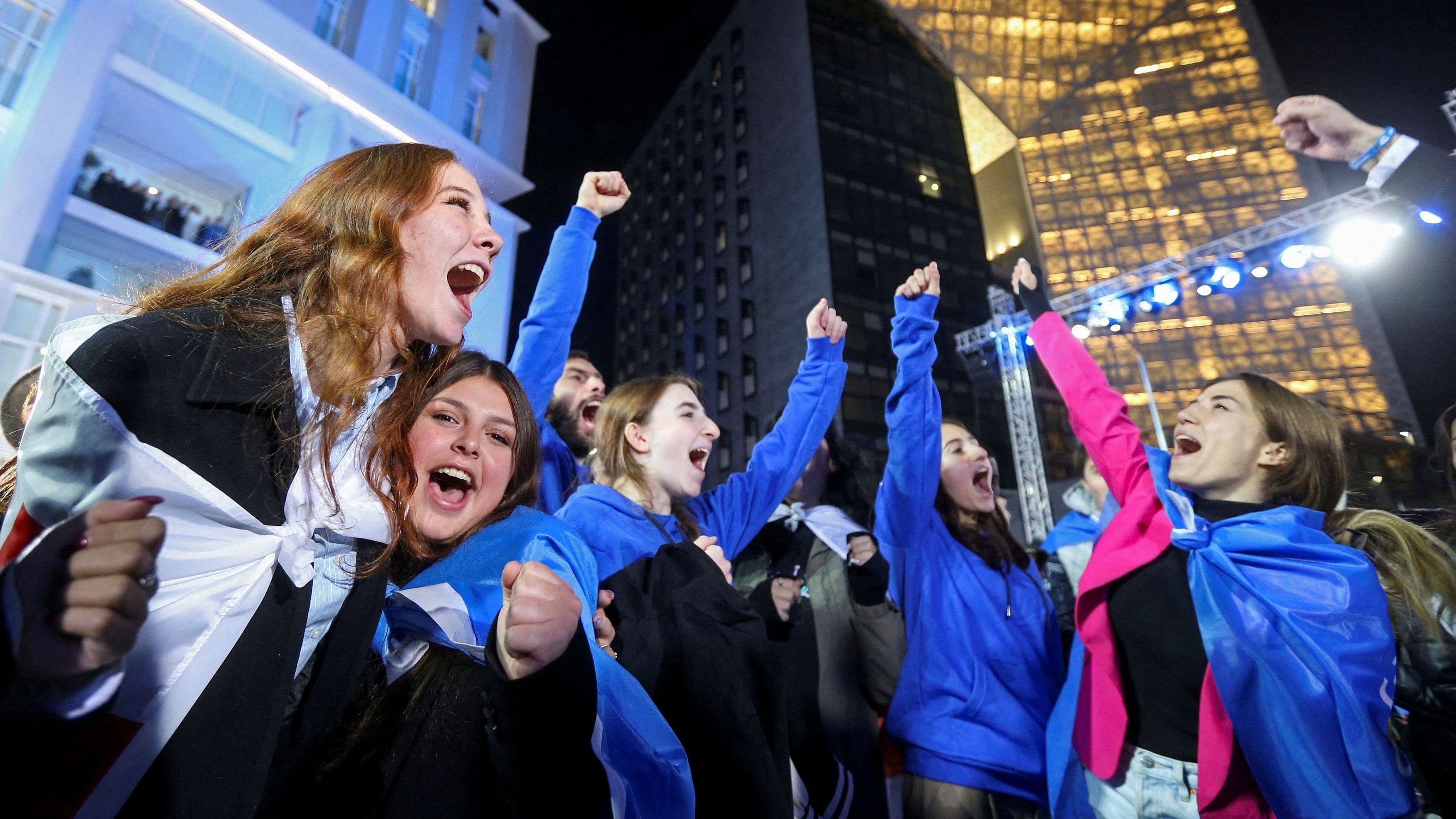 <div class="paragraphs"><p>Supporters of the Georgian Dream party celebrate at the party's headquarters after the announcement of exit poll results in parliamentary elections, in Tbilisi, Georgia October 26, 2024. </p></div>