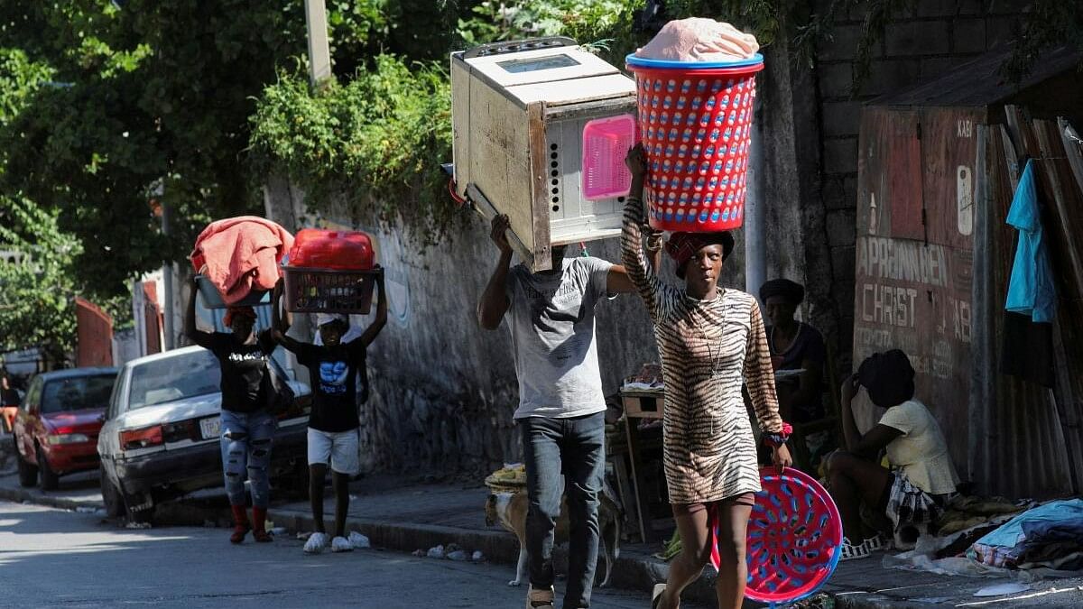 <div class="paragraphs"><p>Haitians flee homes from gang violence, in Port-au-Prince</p></div>