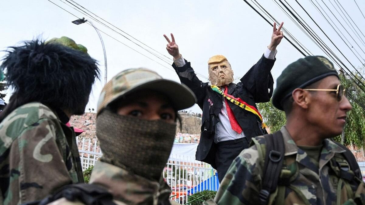 <div class="paragraphs"><p>A person dressed as Donald Trump poses for a photo before taking part in the zombie walk that kicks off the Halloween festivities, in La Paz, Bolivia October 26, 2024.</p></div>