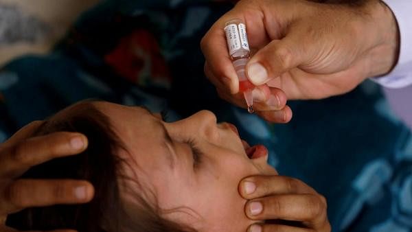 <div class="paragraphs"><p> Polio vaccine drops are administered to a child at a civil dispensary in Peshawar, Pakistan. (Representative image)</p></div>