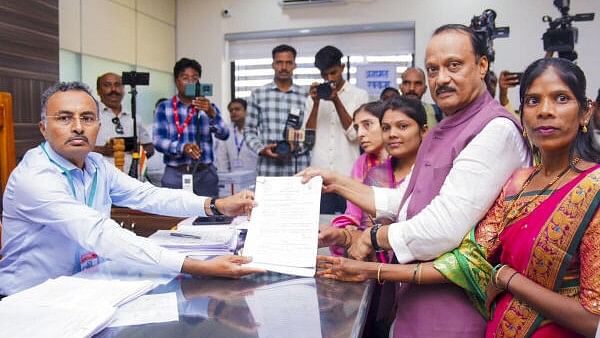 <div class="paragraphs"><p>Maharashtra Deputy Chief Minister and NCP head Ajit Pawar files his nomination from Baramati seat for Assembly polls, in Pune, Monday.&nbsp;</p></div>