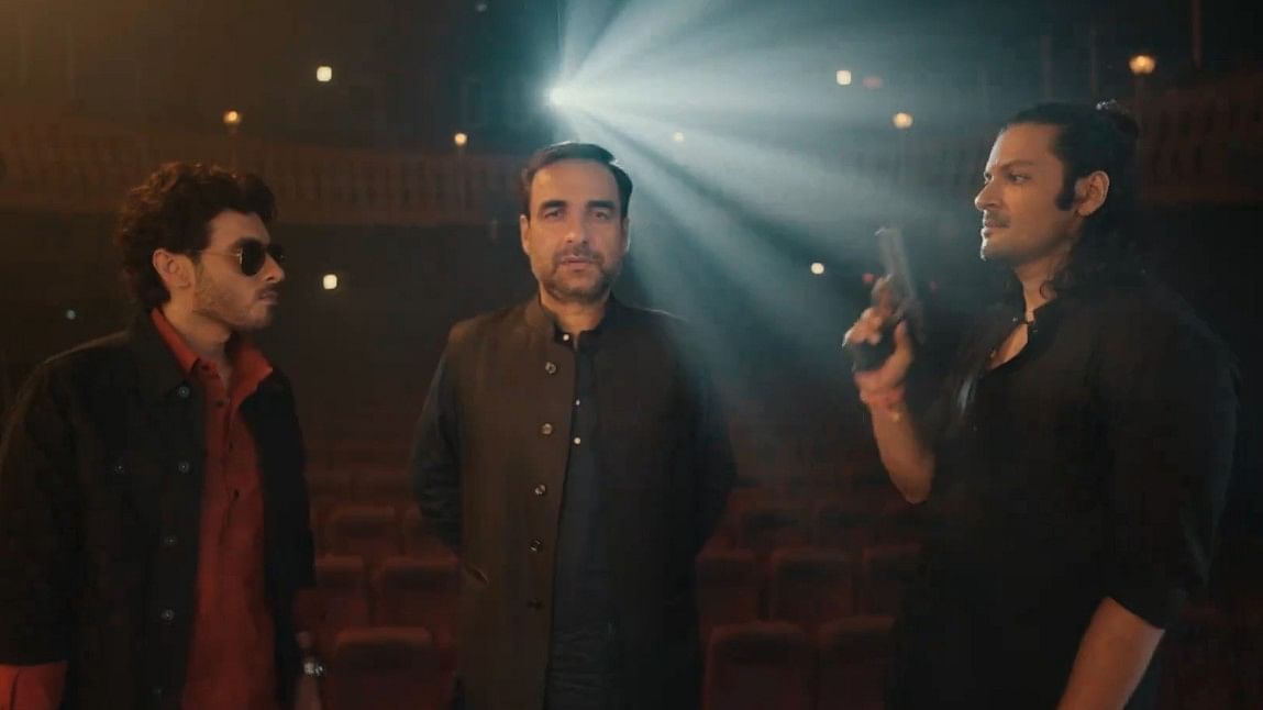 <div class="paragraphs"><p>Divyenndu, Pankaj Tripathi and Ali Fazal (L to R) from the teaser of 'Mirzapur: The Film'.&nbsp;</p></div>