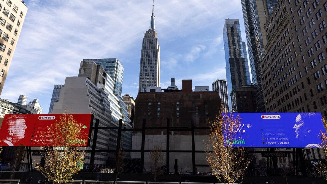 <div class="paragraphs"><p>Pictures of US Presidential candidates, Former US President Donald Trump and US Vice President Kamala Harris, are displayed before the rally of Former US President Donald Trump at the Madison Square Garden in New York City, US, October 26, 2024. </p></div>