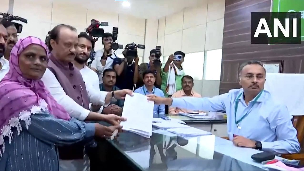 <div class="paragraphs"><p>Ajit Pawar filing his nomination papers.</p></div>