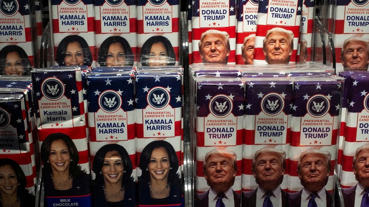 <div class="paragraphs"><p>Chocolate bars with the faces of Democratic presidential nominee US Vice President Kamala Harris and Republican presidential nominee and former US President Donald Trump are displayed at a store in John F. Kennedy International Airport, New York, US, October 25, 2024.</p></div>