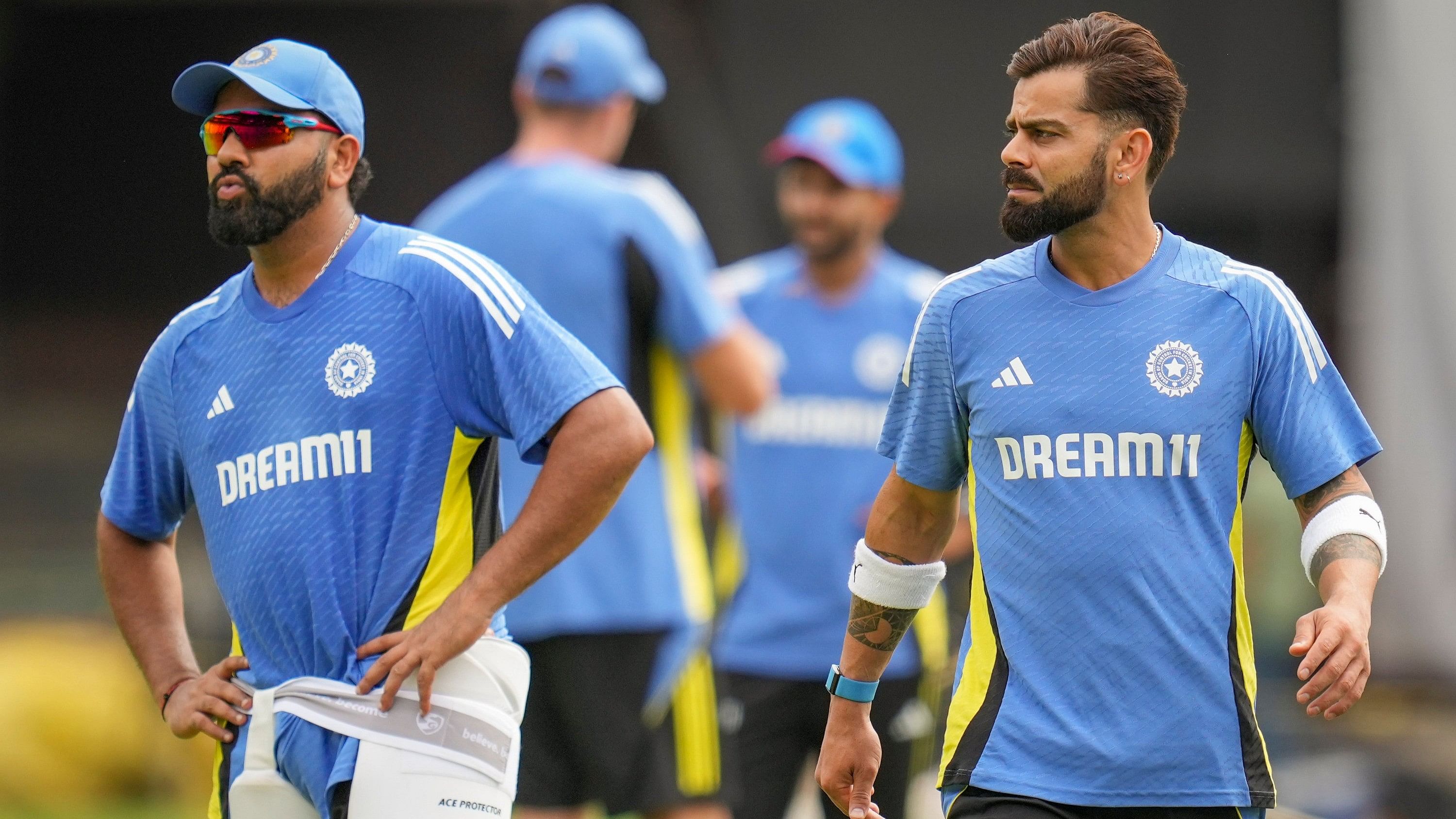 <div class="paragraphs"><p>Rohit Sharma and Virat Kohli during a training session.</p></div>