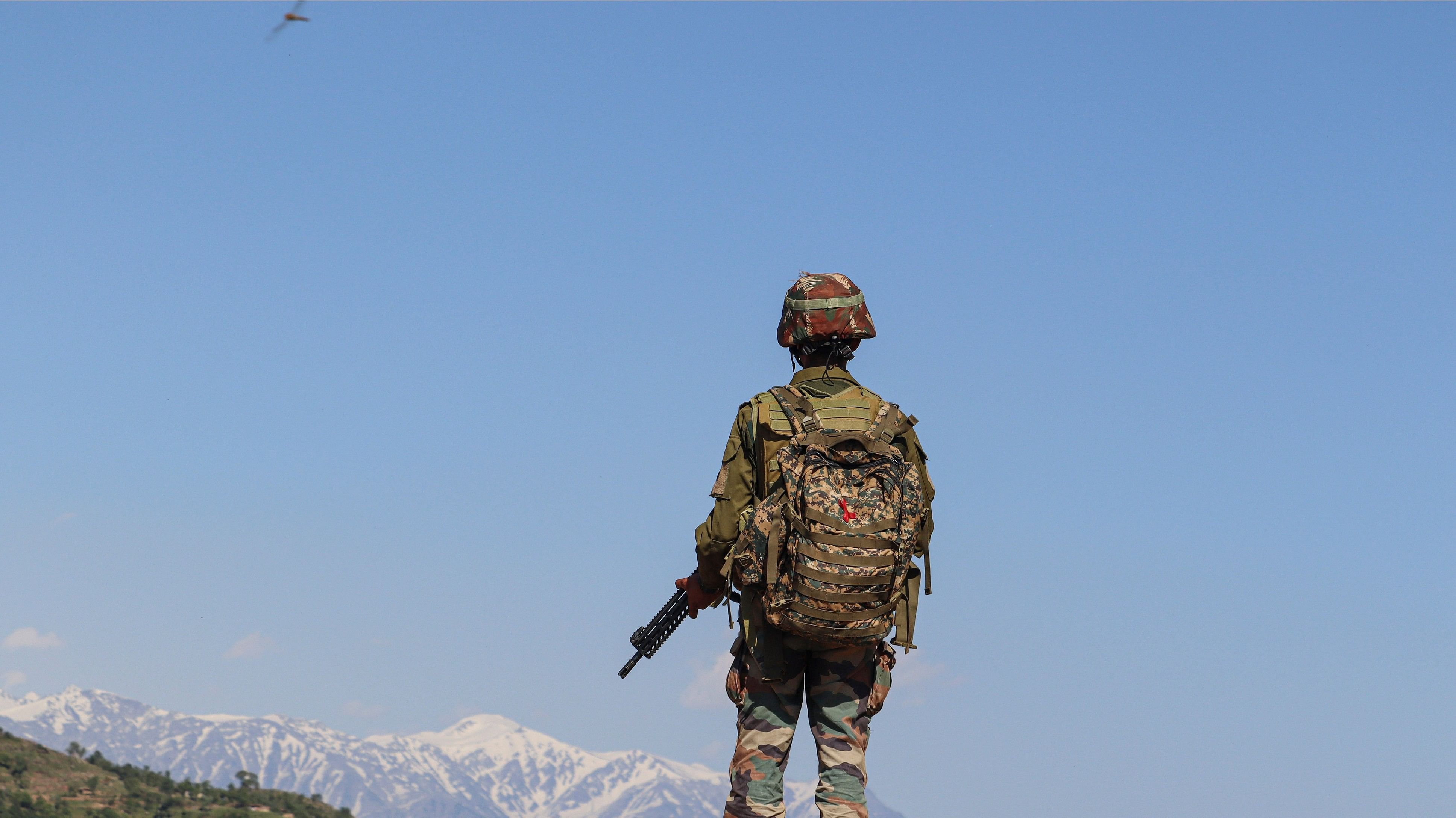 <div class="paragraphs"><p>An Indian Army soldier stands guard near the Line of Control (LoC), in Poonch district of Jammu &amp; Kashmir.</p></div>