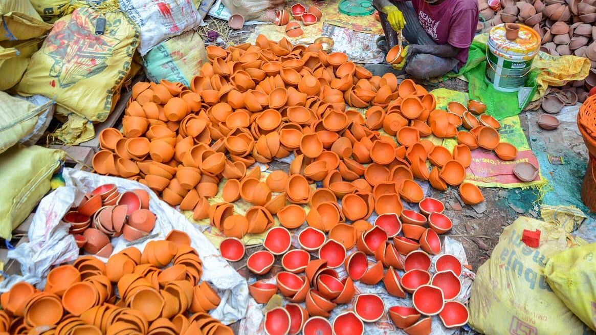 <div class="paragraphs"><p>Earthen lamps being made ahead of Diwali. (Representative image)</p></div>