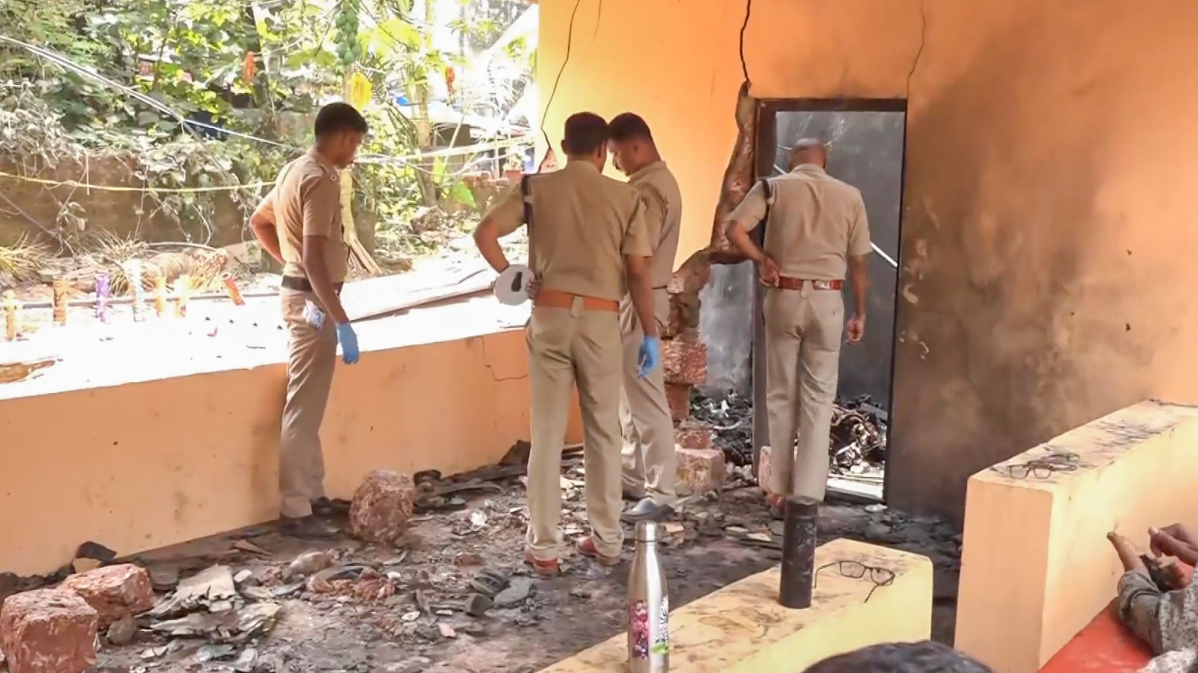 <div class="paragraphs"><p> Police inspect the fire accident spot at the Anjootambalam Veererkavu Temple at Neeleswaram in Kasaragod district, Tuesday, Oct. 29, 2024. </p></div>