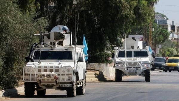 <div class="paragraphs"><p>UN peacekeepers (UNIFIL) vehicles are seen parked in Marjayoun, near the border with Israel, in southern Lebanon</p></div>