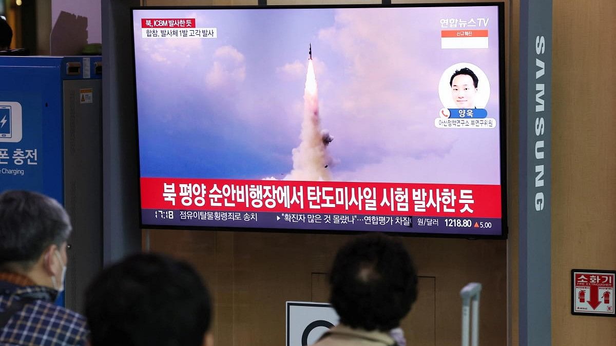 <div class="paragraphs"><p>People watch a TV broadcasting a news report on North Korea's intercontinental ballistic missile (ICBM) test, in Seoul.</p></div>