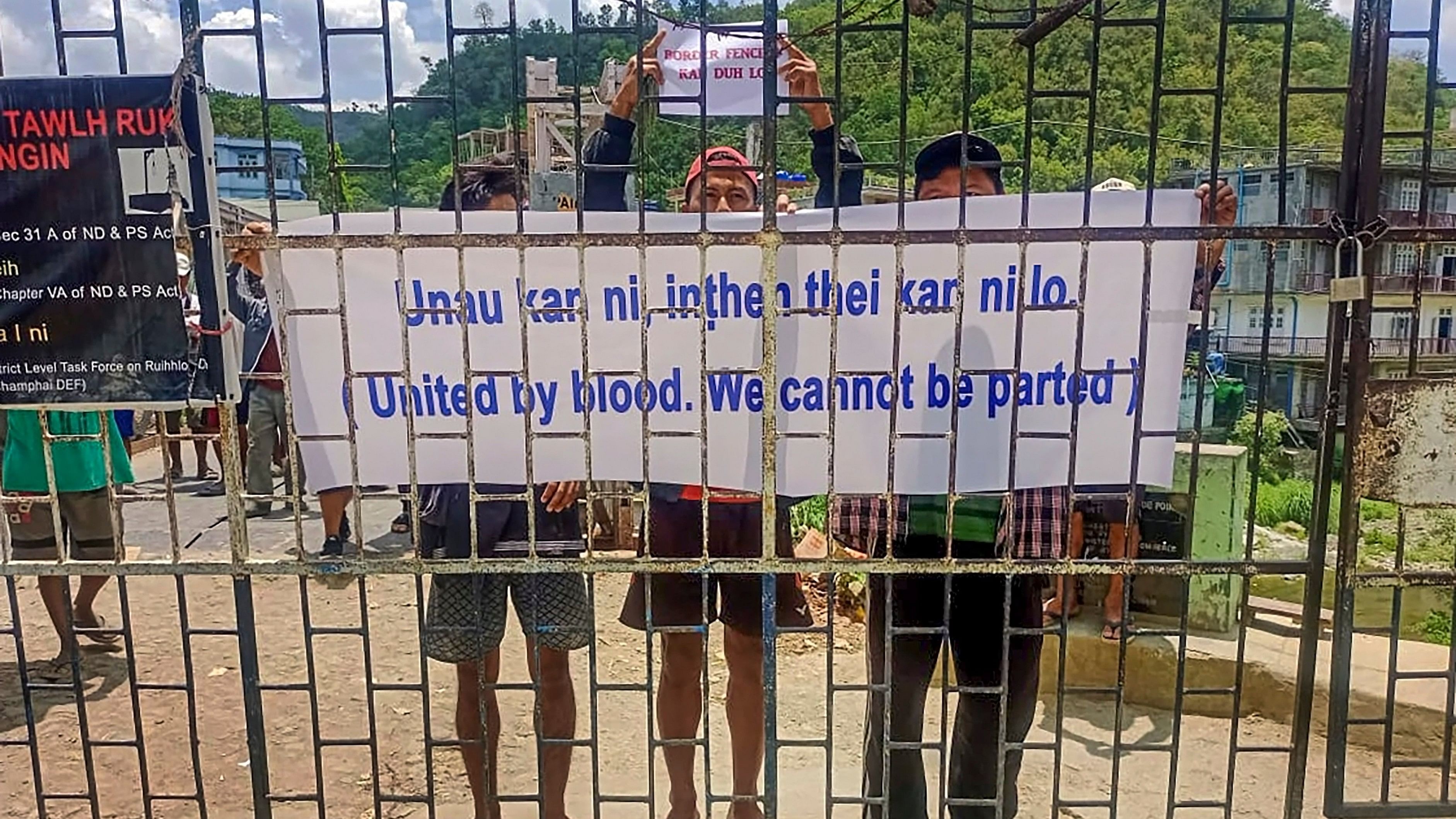 <div class="paragraphs"><p>A banner being put up against scrapping of the Free Movement Regime (FMR) at Indo-Myanmar Friendship Gate, at Zokhawthar village along India-Myanmar border, in Champhai district of Mizoram.</p></div>