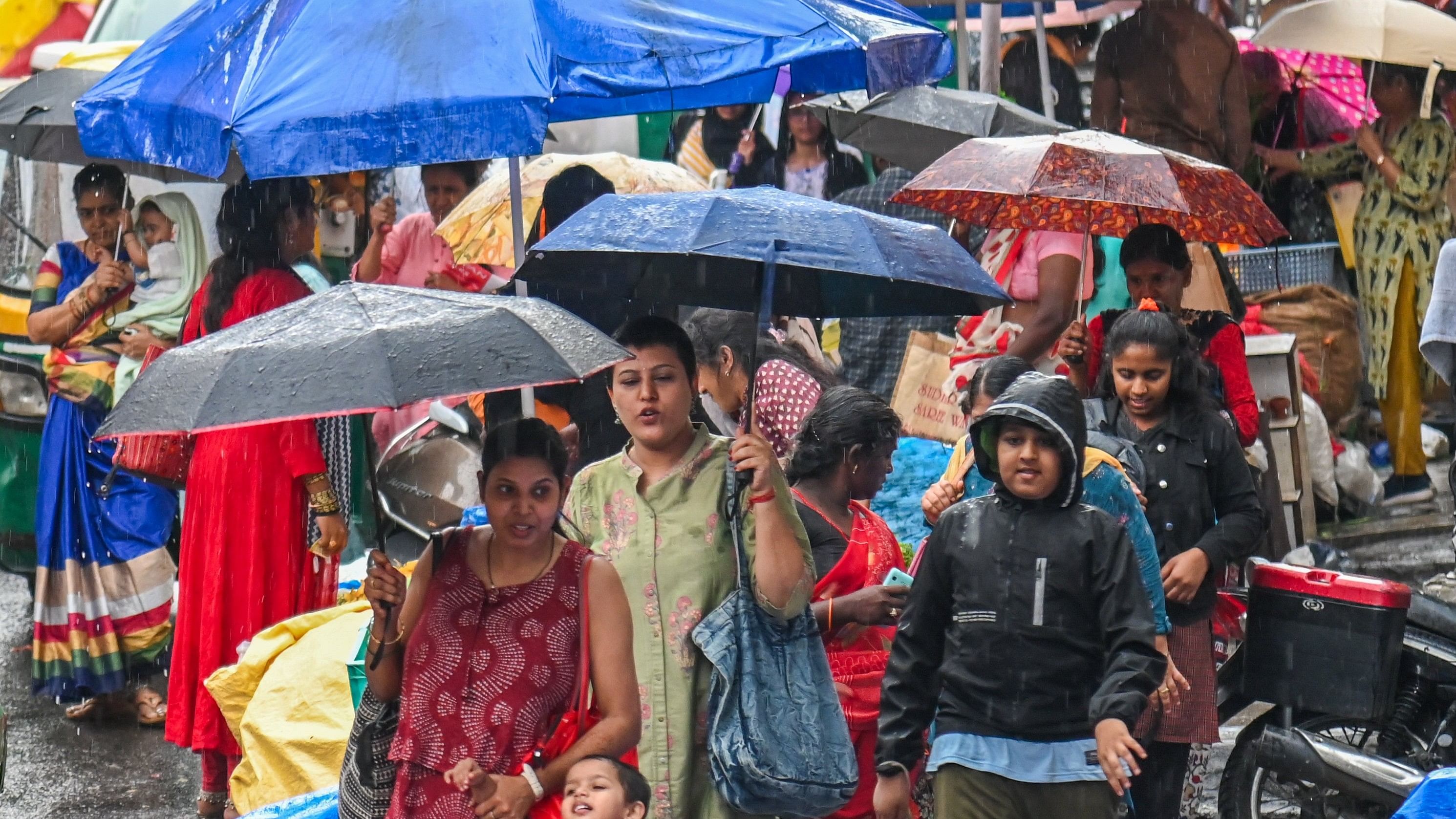 <div class="paragraphs"><p>Rain-soaked Malleswaram on Wednesday evening. </p></div>