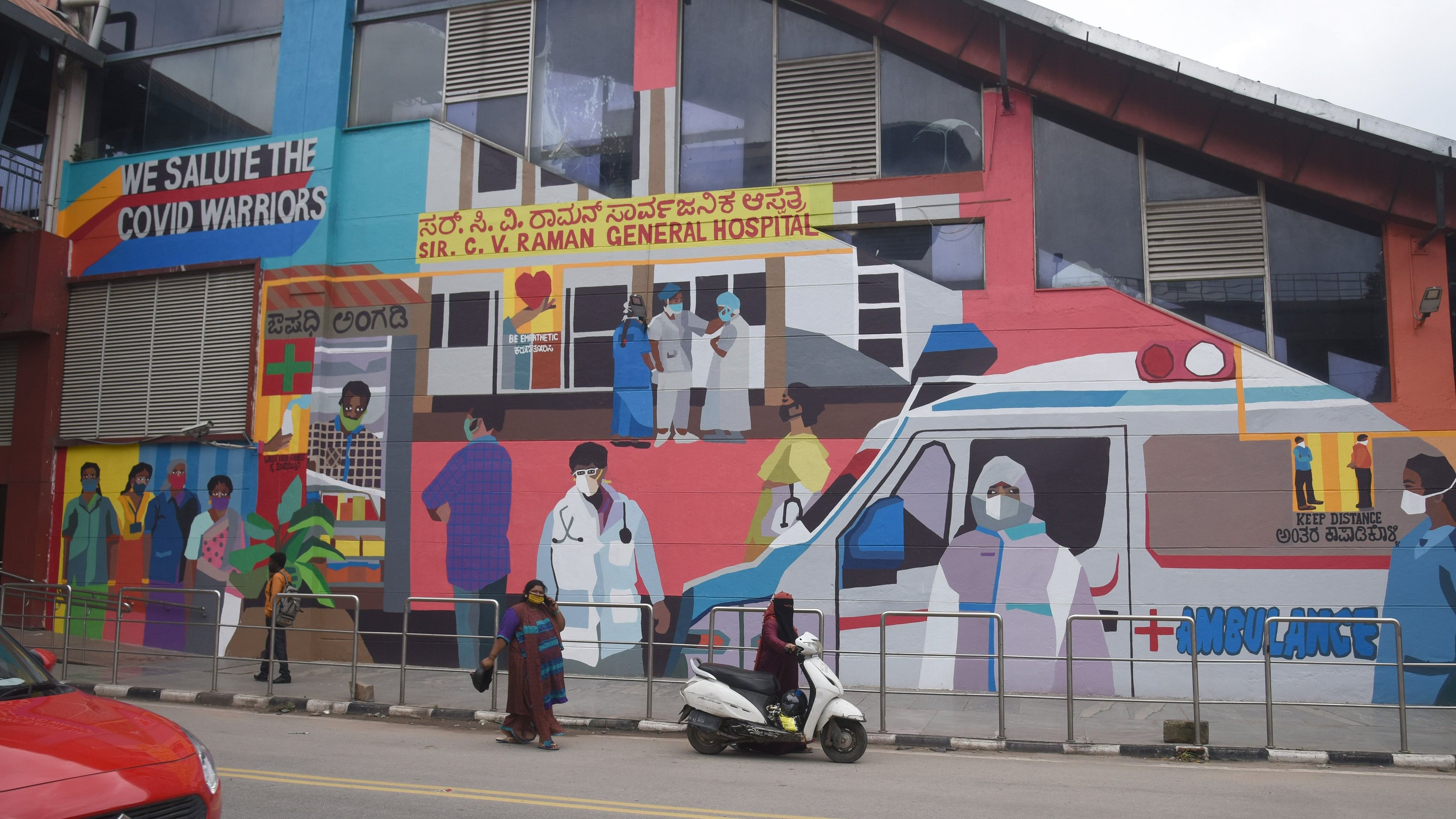 <div class="paragraphs"><p>Members of Bengaluru Transgender Community and artist pay the tribute to Covid Warriors through painting on wall, in association with Nippon Paint, Aravani project at Swami Vivekananda Metro Station wall at old Madras road in Bengaluru on Monday, 12 October 2020. </p></div>