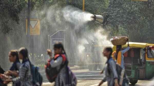 <div class="paragraphs"><p>An anti-smog gun being used to curb air pollution, at Shahjahan Road in New Delhi.</p></div>