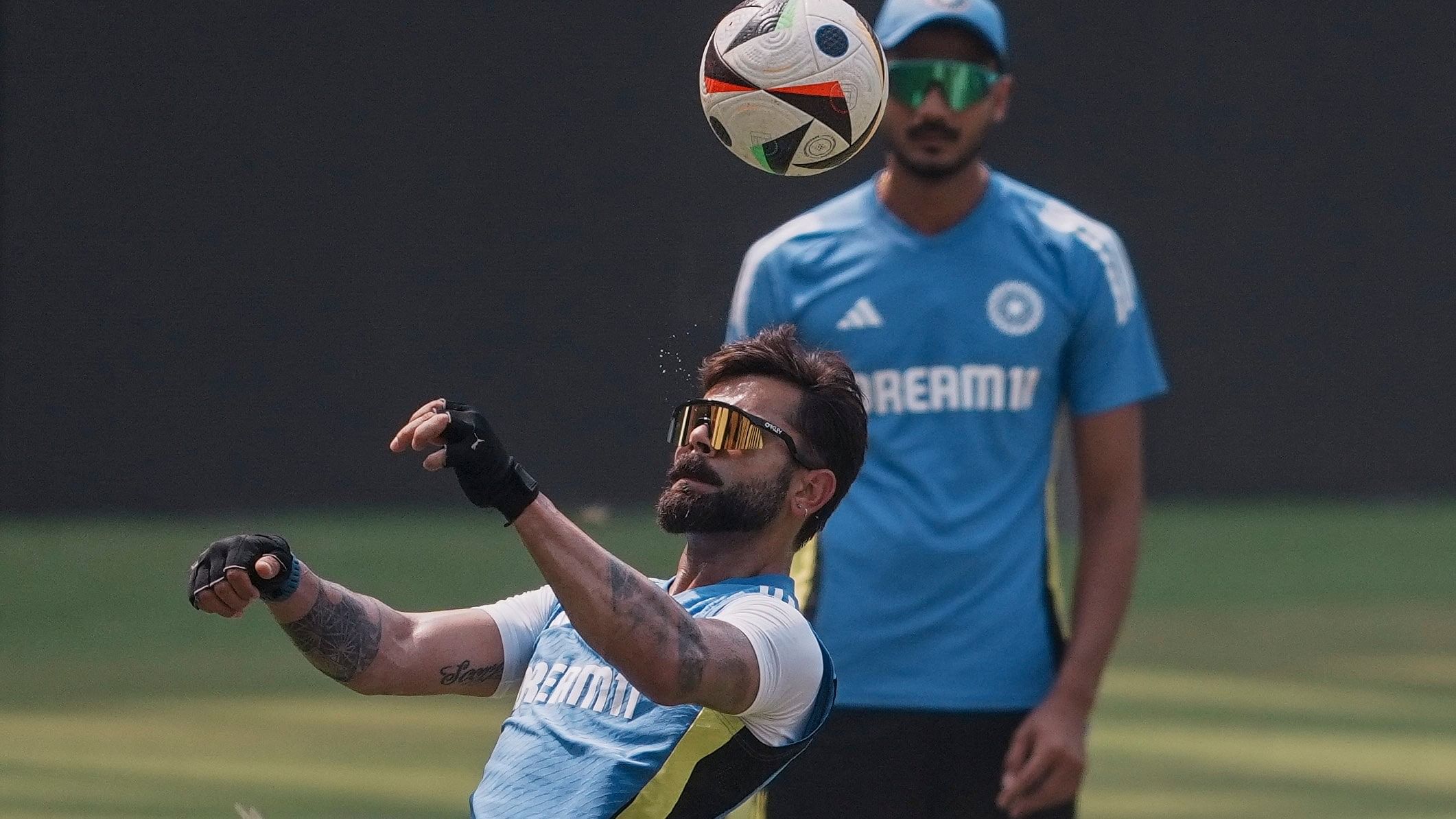 <div class="paragraphs"><p> India's Virat Kohli during a practice session ahead of the third Test cricket match against New Zealand, at Wankhede Stadium in Mumbai, Wednesday.&nbsp;</p></div>