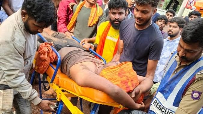 <div class="paragraphs"><p>An injured person being shifted to the hospital. Many devotees sustained fractures after falling from the slippery hills on Deviramma fair in Mallenahalli on Thursday.</p></div>