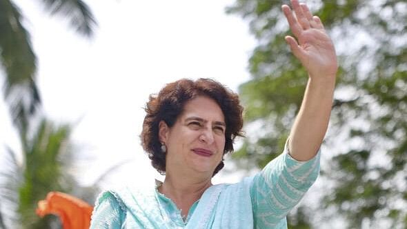 <div class="paragraphs"><p>Congress candidate for Wayanad Lok Sabha by-polls Priyanka Gandhi during a road show, in Therattammal, Kerala.</p></div>