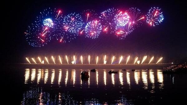 <div class="paragraphs"><p>Fireworks illuminate the sky above the banks of the Saryu river during ‘Deepotsav 2024’ celebration on the eve of the Diwali festival, in Ayodhya. </p></div>